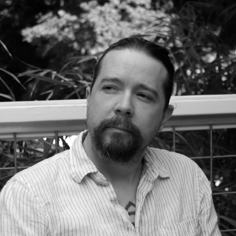 A headshot of Sean